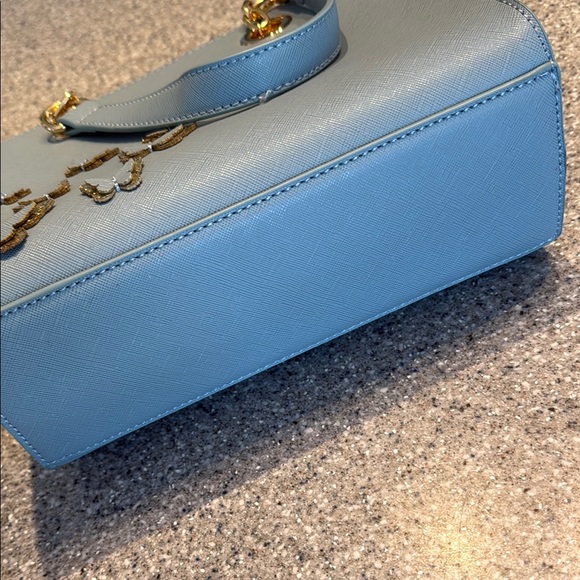 Elegant Blue Handbag with Gold Accents - Picture 7 of 7